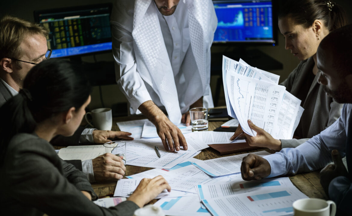 Group of business people working together in a meeting room