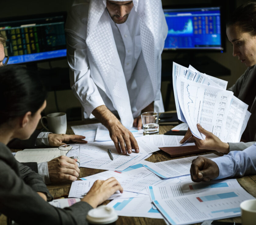 Group of business people working together in a meeting room